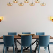Если стол смещён к одной из стен комнаты, можно дополнительно использовать для его подсветки настенные или подвесные светильники